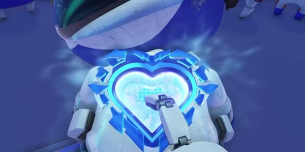 A robot hand pushing a replacement heart into Astro Bot's chest.